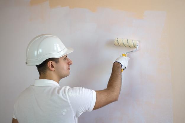 House painters with paint roller | Free Photo